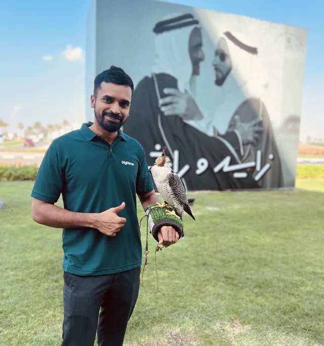 Abhijith holding a falcon
